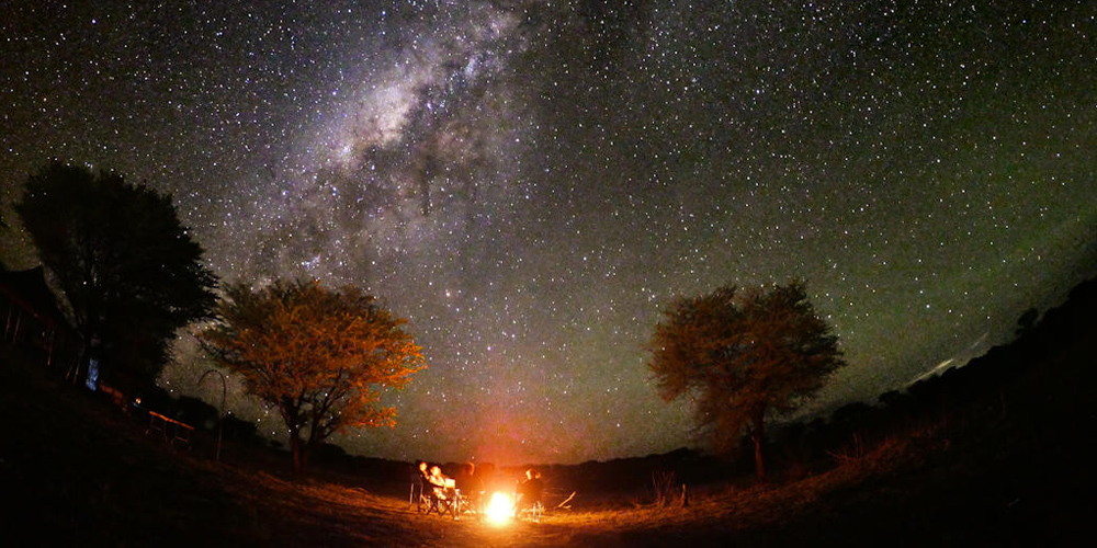 stargazing around the campfire on a tanzania walking safari