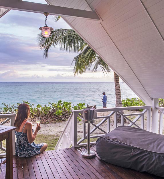 Relaxing at beach bungalow on Alphonse Island in the Seychelles