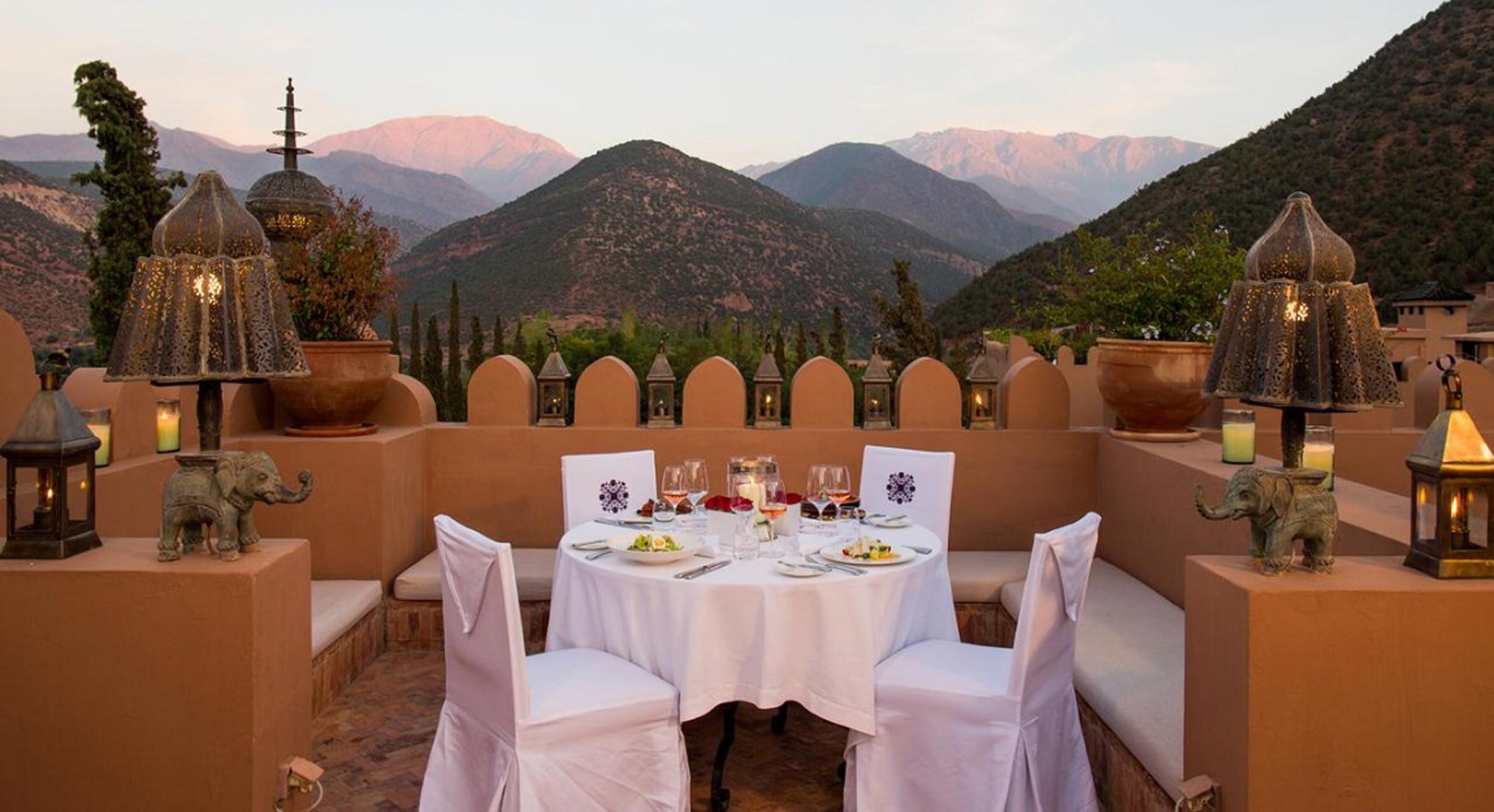 Dining at Kasbah Tamadot with view of Atlas Mountains in Morocco