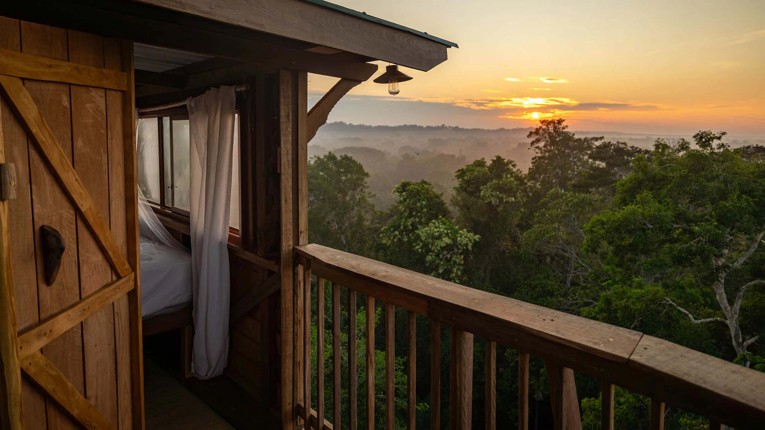 Alta Treehouse at sunrise in Peru's Amazon rainforest