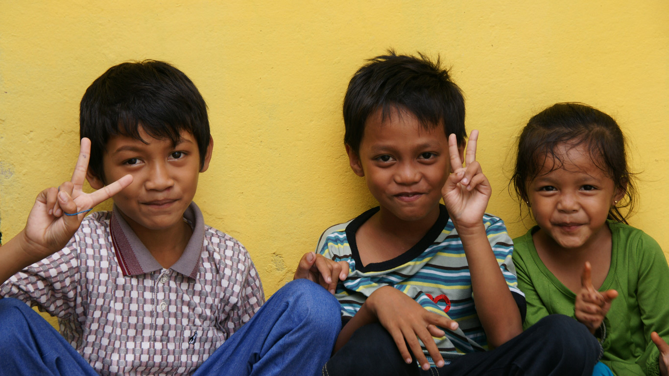 Cheeky children posing for photo in Borneo