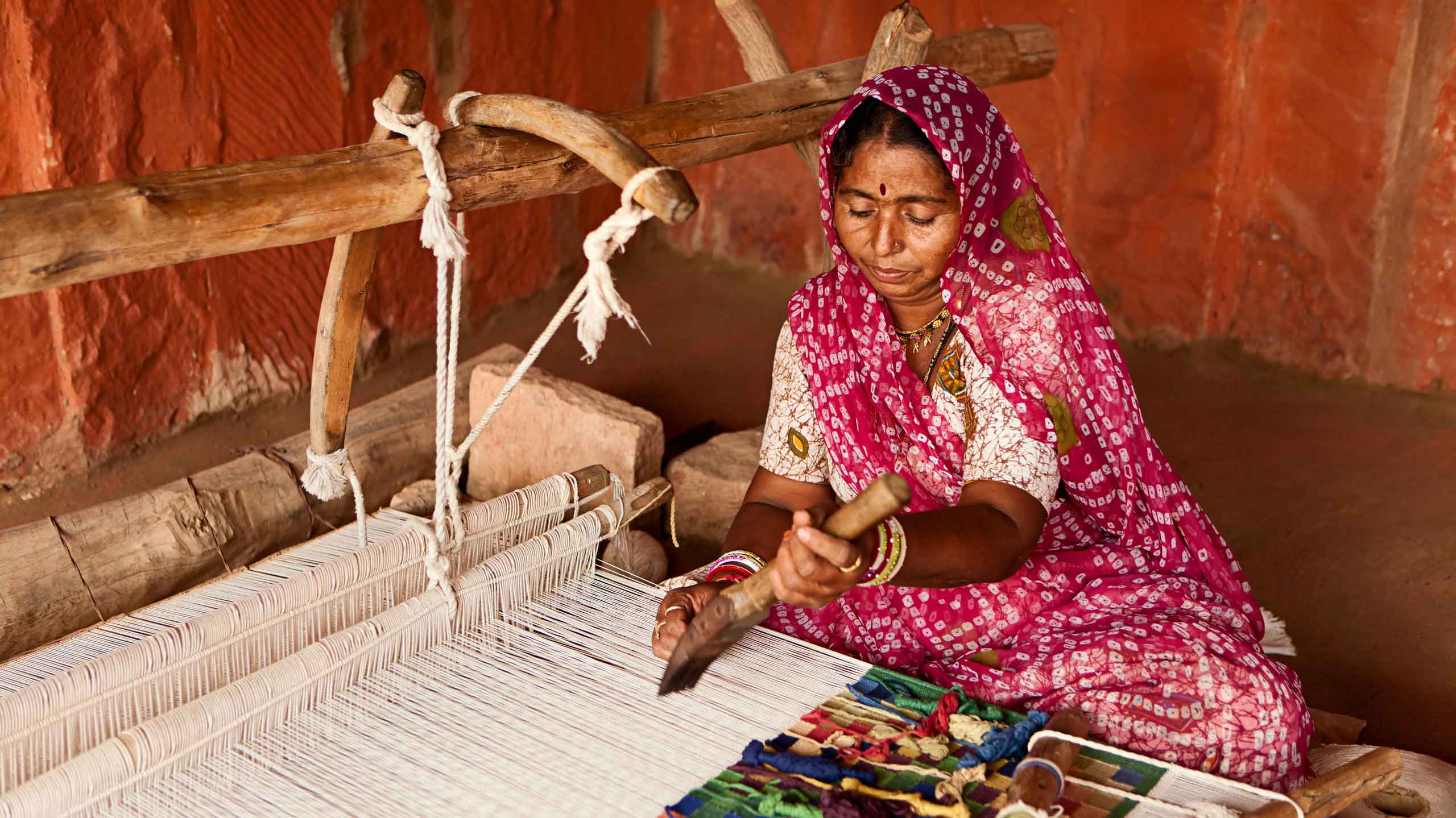 Indian women in Rajasthan weaving
