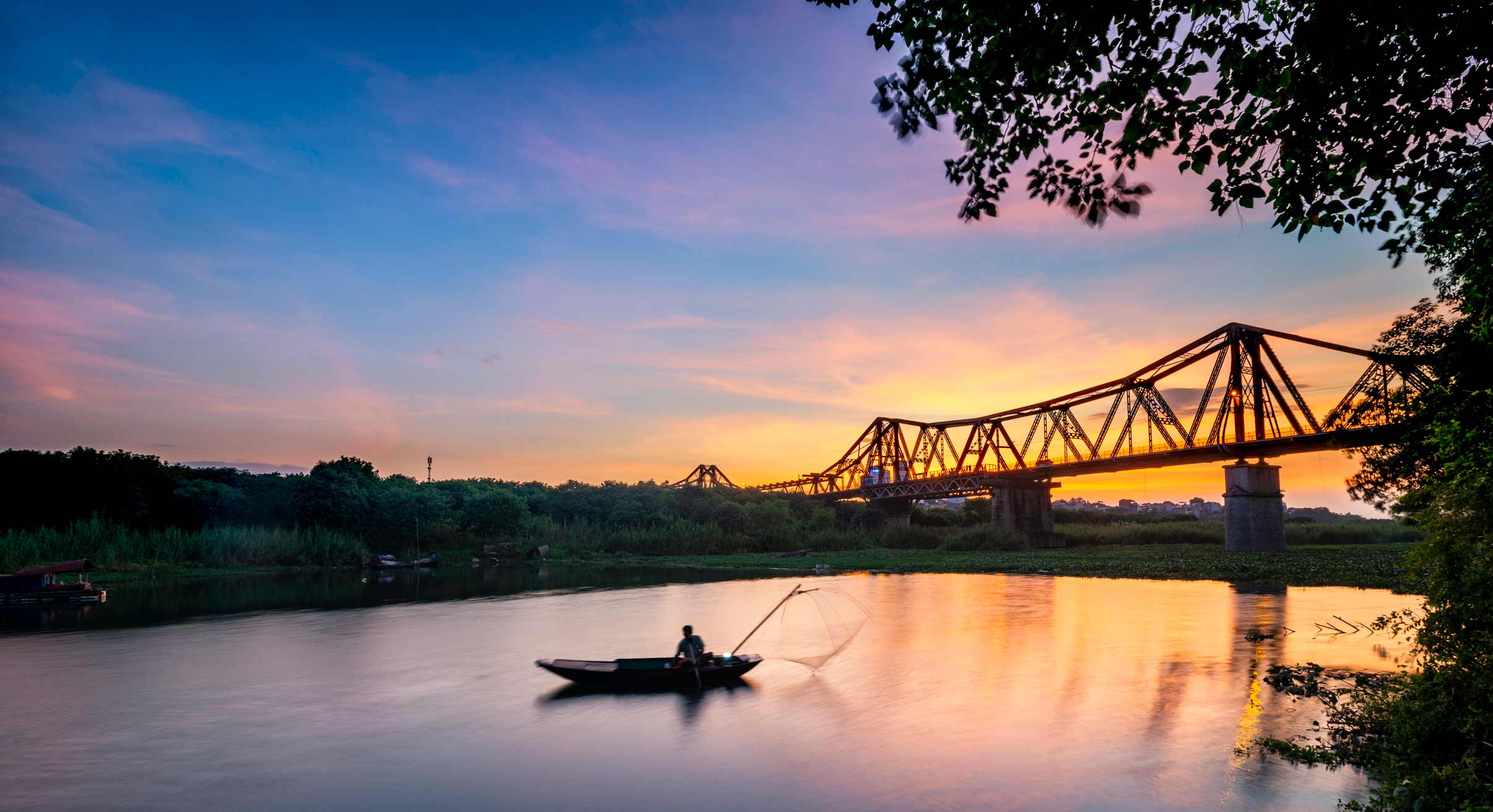 Long Bien Bridge and river in Hanoi, Vietnam