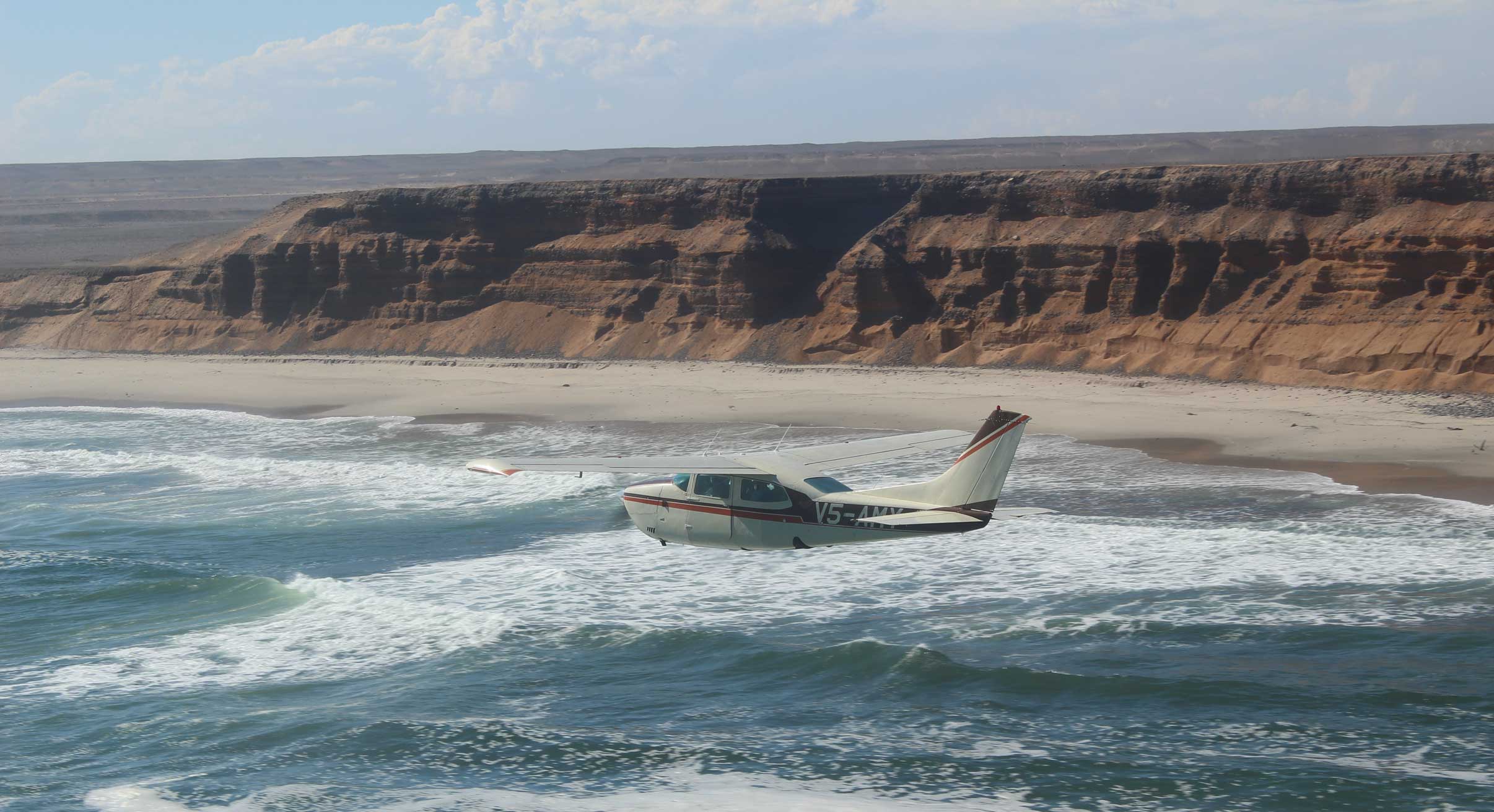 Flying over sea on Skeleton Coast in Namibia
