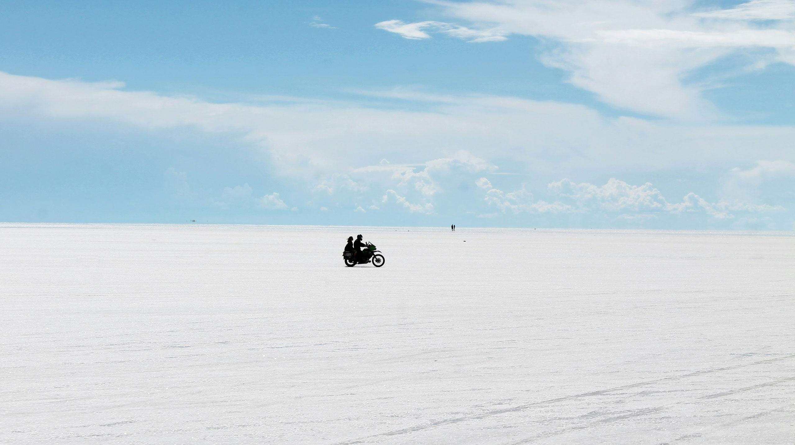 Motorbike across salt flats in Bolivia