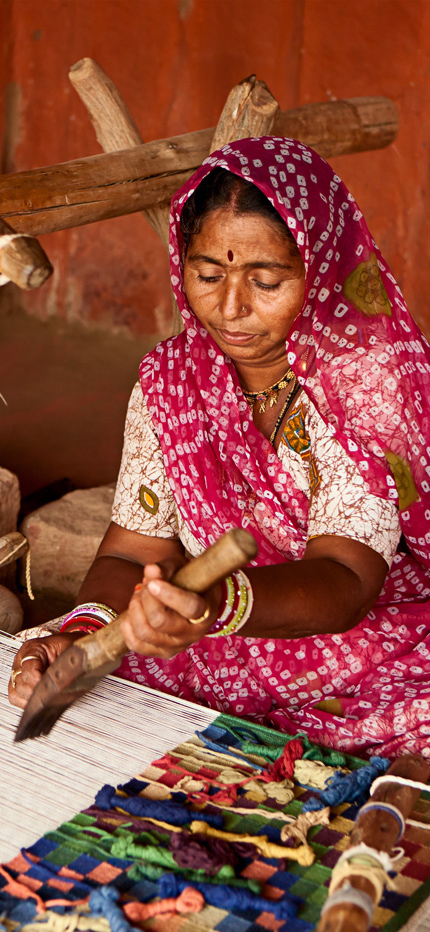 Woman in Rajasthan weaving in philanthropic project