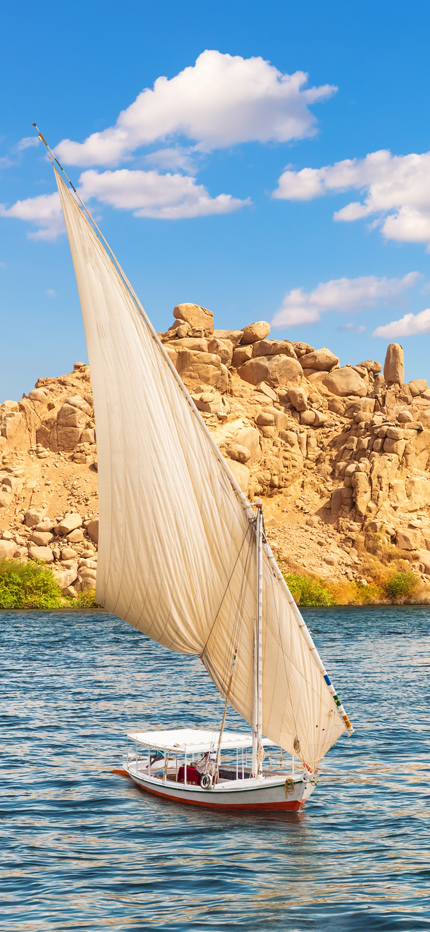 Sailing past Aswan temple on the Nile in Egypt