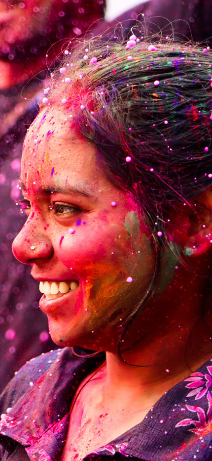 Girl celebrating Holi festival in India