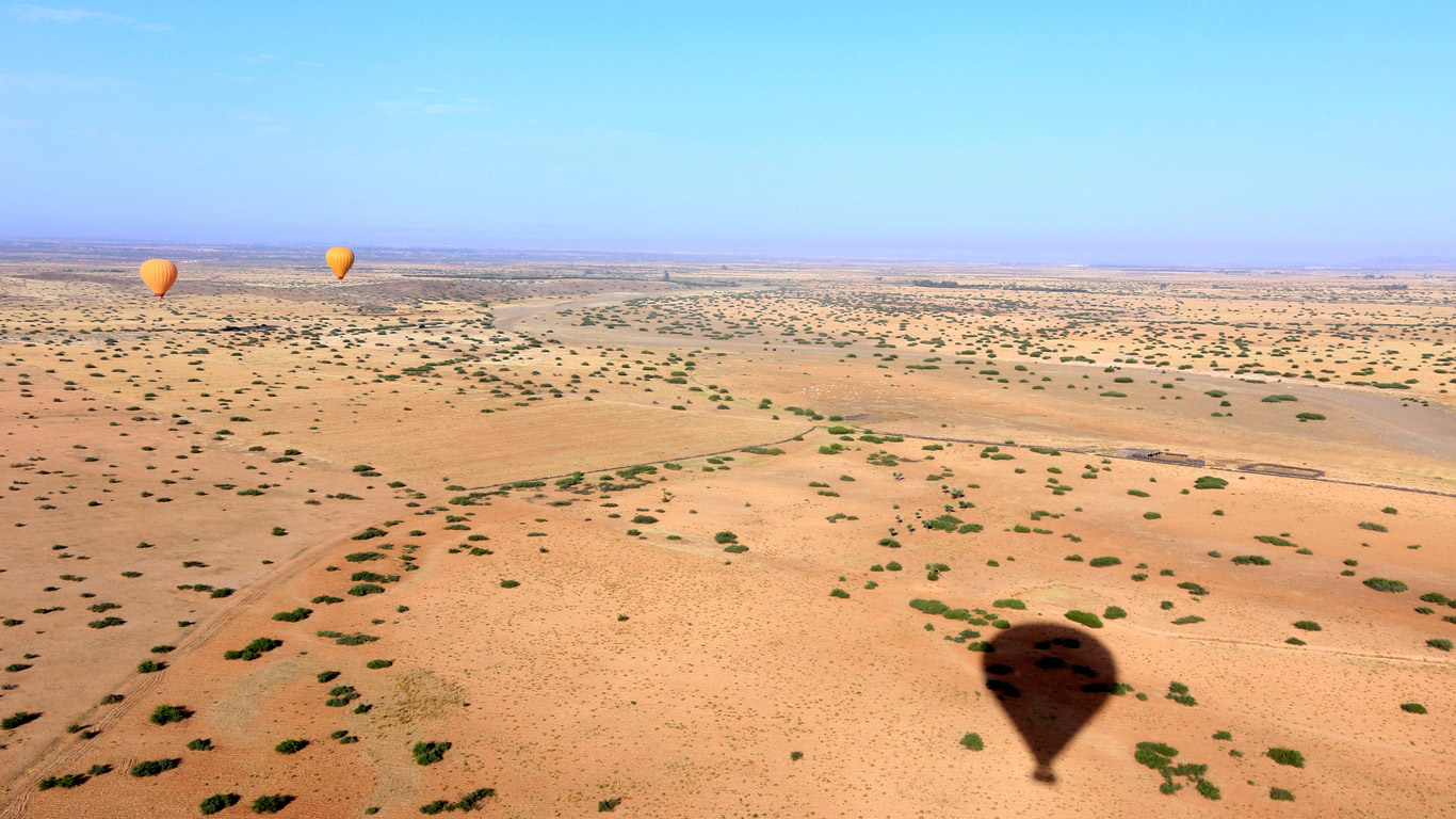 Hot air balloon over desert in Morocco
