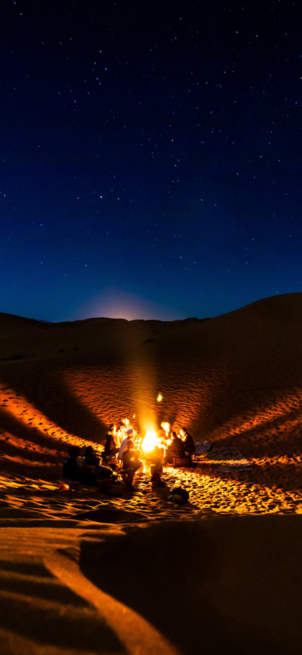 Camping in Moroccan desert at night