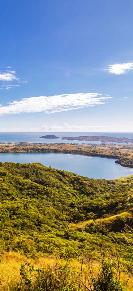View from Mont Passot above the crater lake Lac Amparihibe and the Indian Ocean, Nosy Be, Madagascar