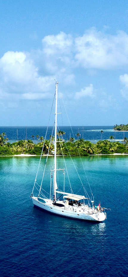 Private yacht charter sailing around islands
