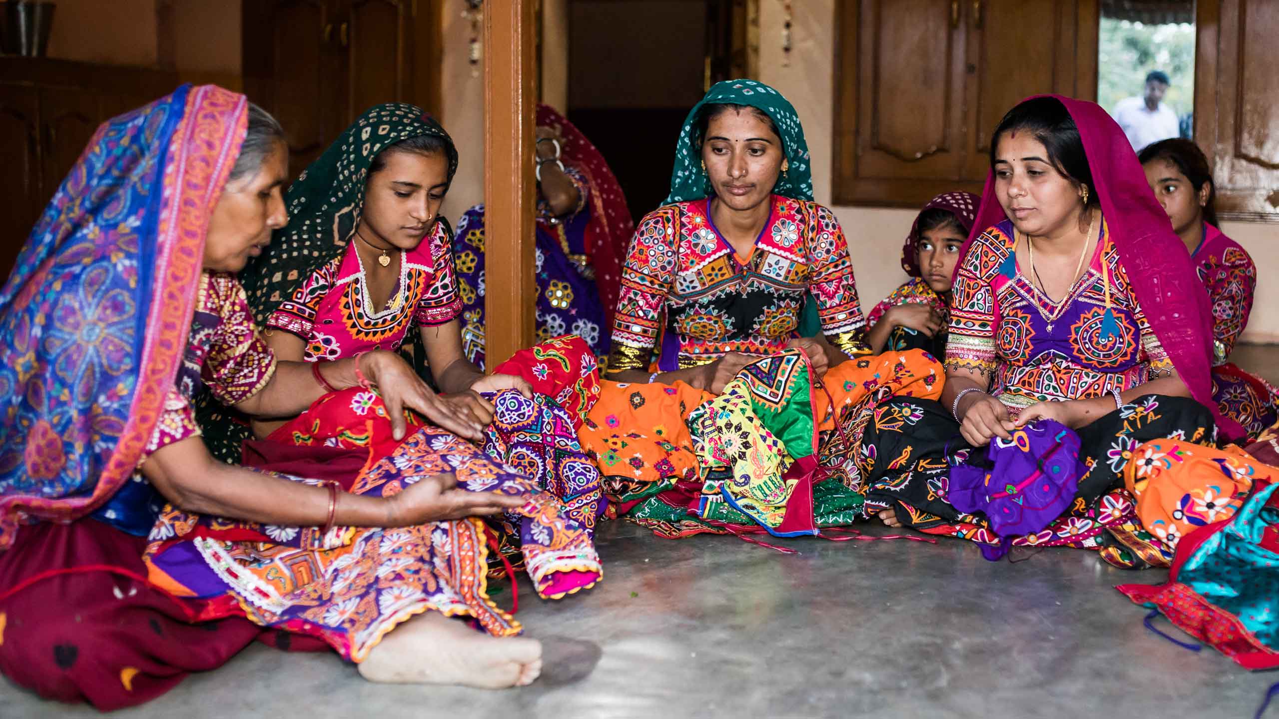 Women working on hand embroidery in India
