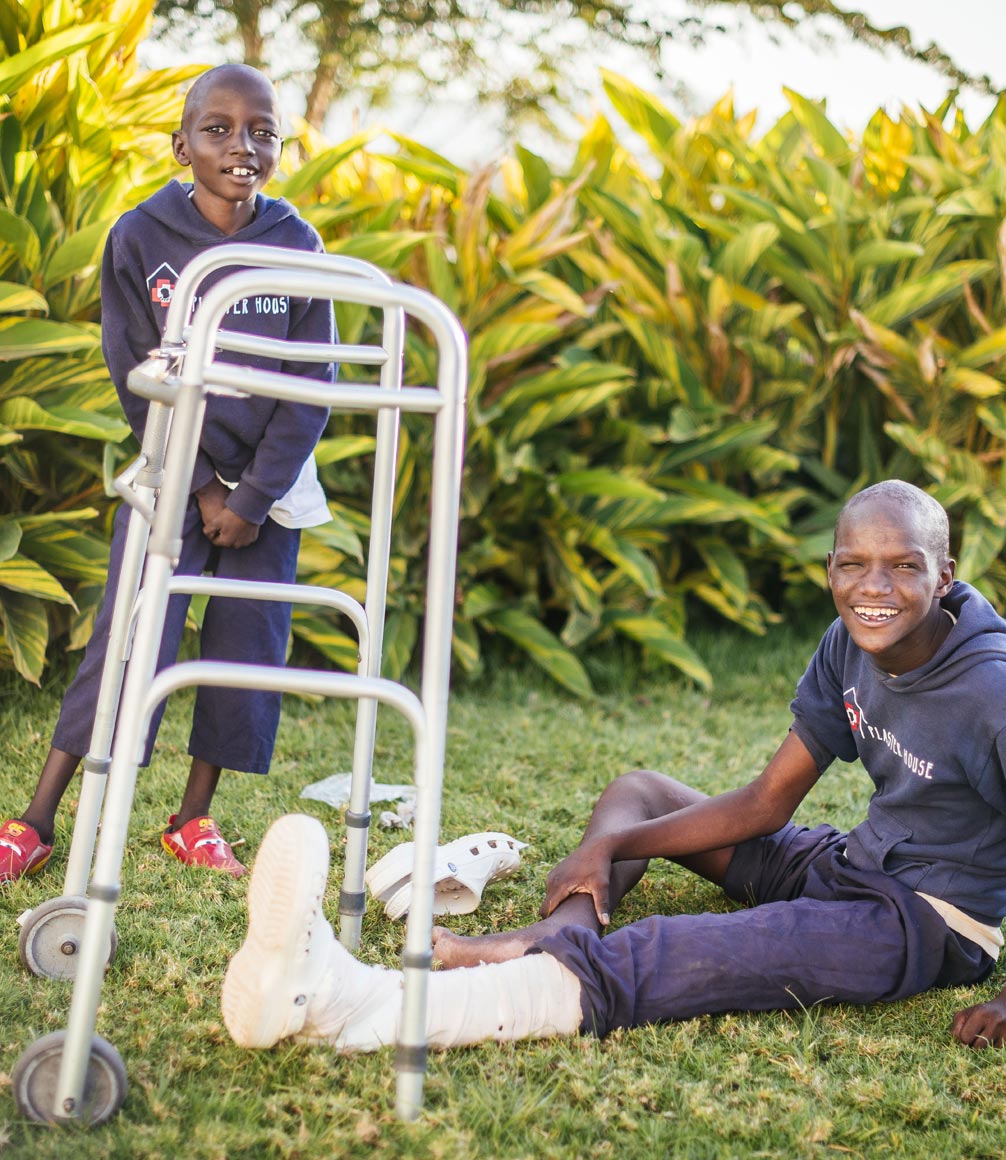 Children with crutches at Kafika House in Tanzania