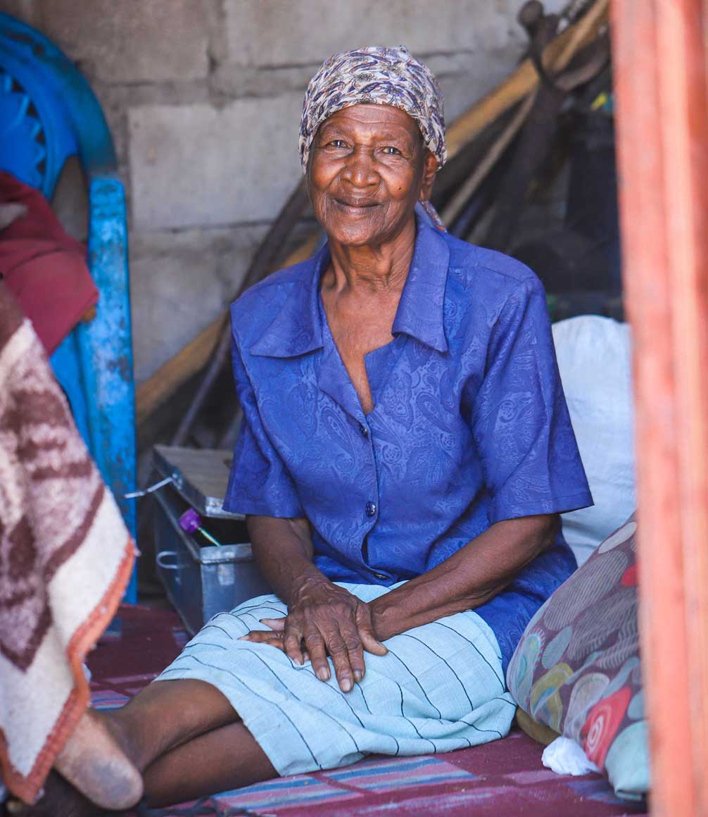Travel for Impact in Botswana supporting elderly woman