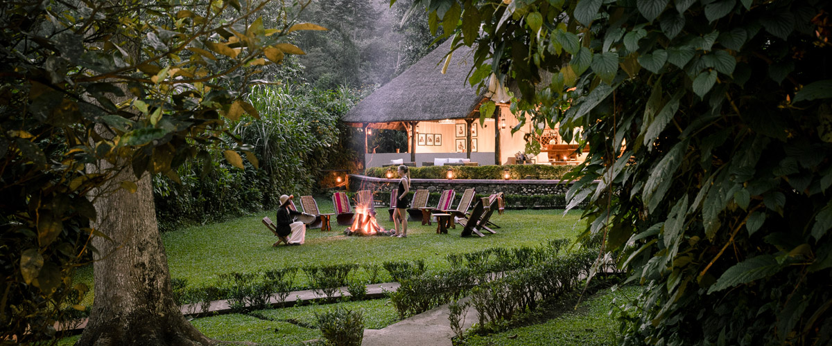 Uganda, Sanctuary Gorilla Forest Camp outside area and campfire