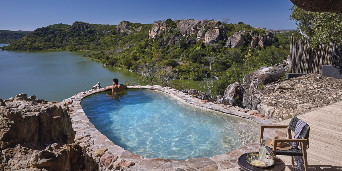 view of lake from the private plunge pool at singita pamushana lodge