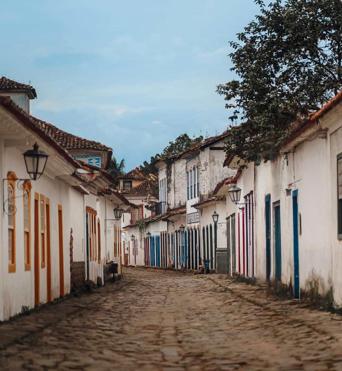 cobbled street in lima lined with houses