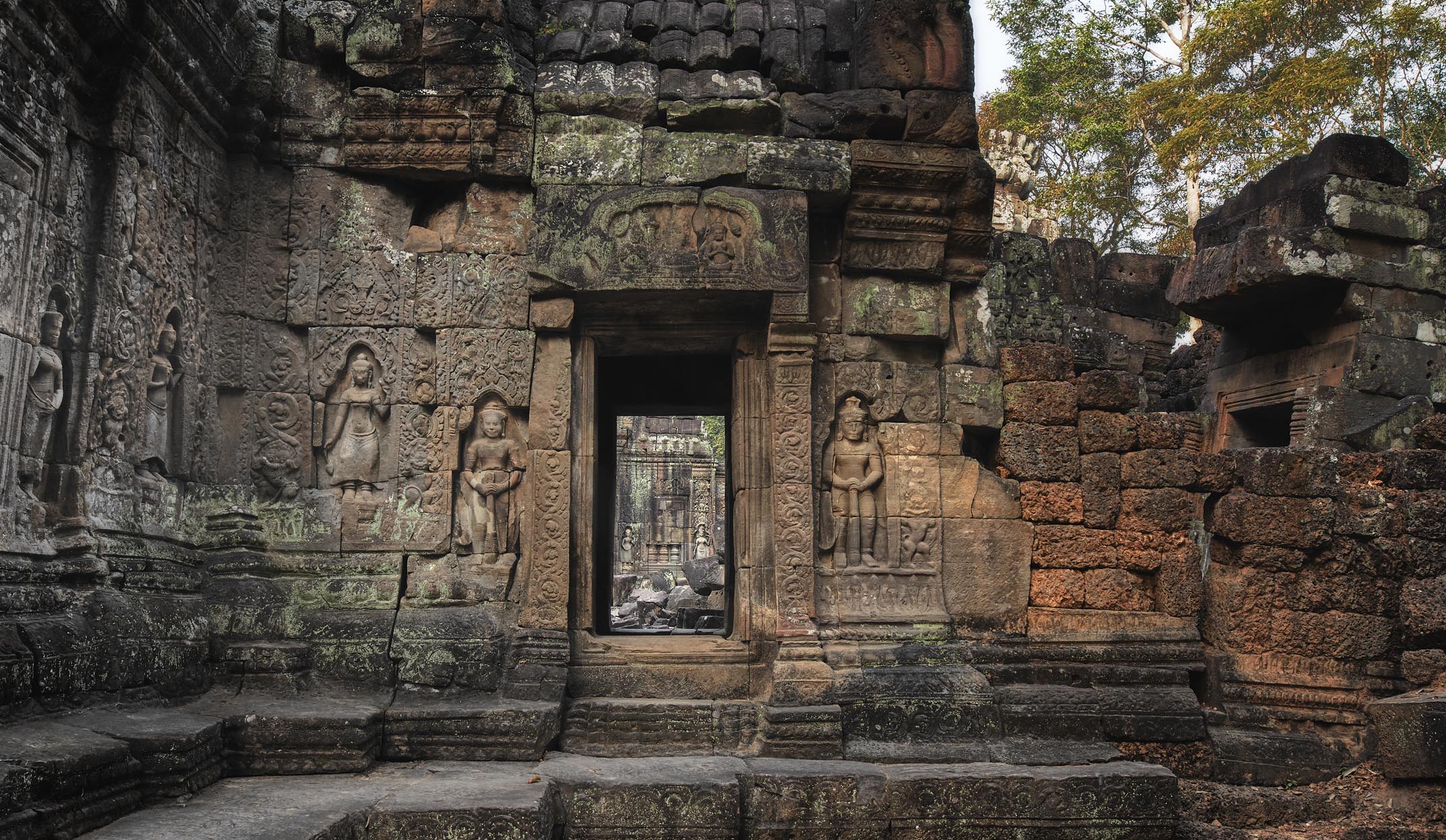 siem reap temples and statues on the walls of preah khan temple