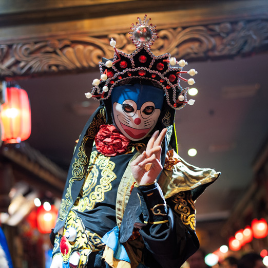 Chinese artist perform traditional face-changing art or bianlian at Chunxifang Chunxilu in Chengdu, Sichuan Province in China