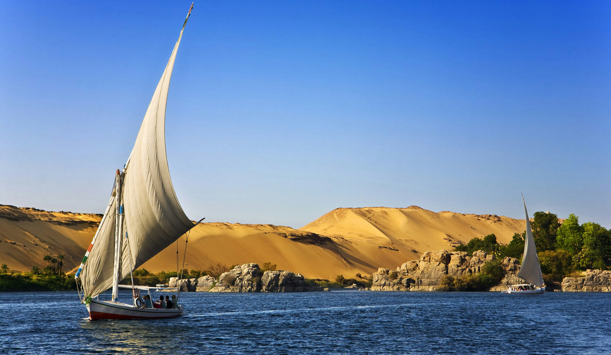 sailboats on the river nile near aswan egypt
