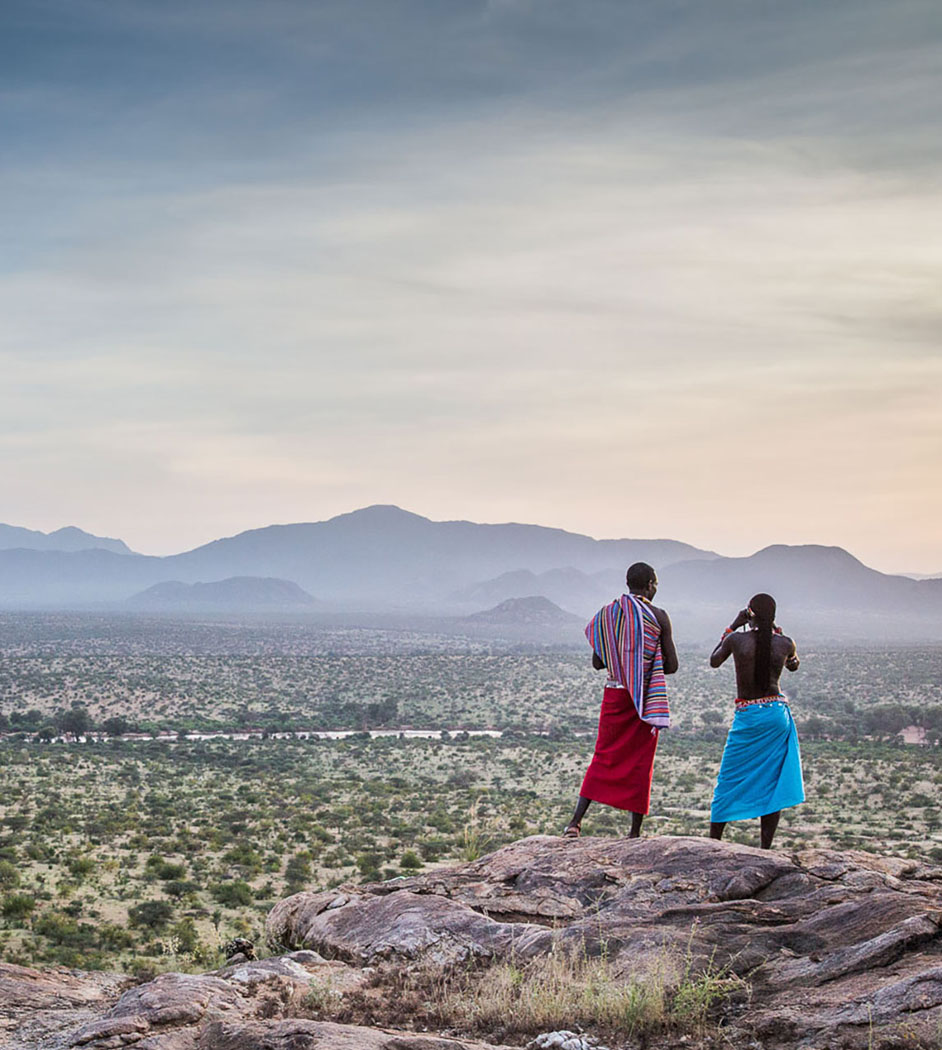 samburu maasai warriors overlooking the landsscape
