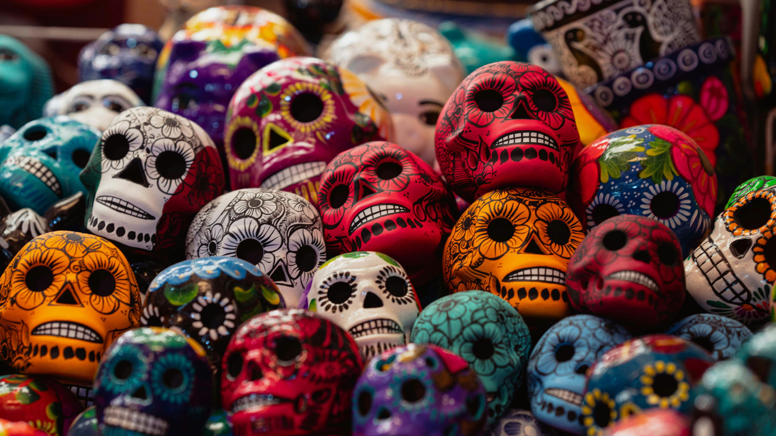 painted model skulls on display in mexico city on day of the dead