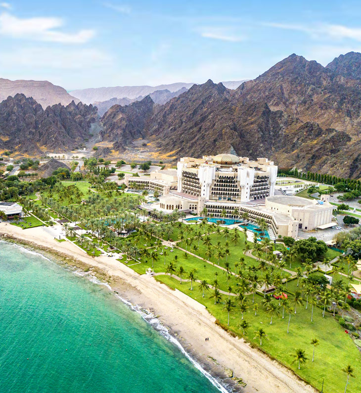 view of the exterior of al bustan palace, ritz carlton hotel in oman