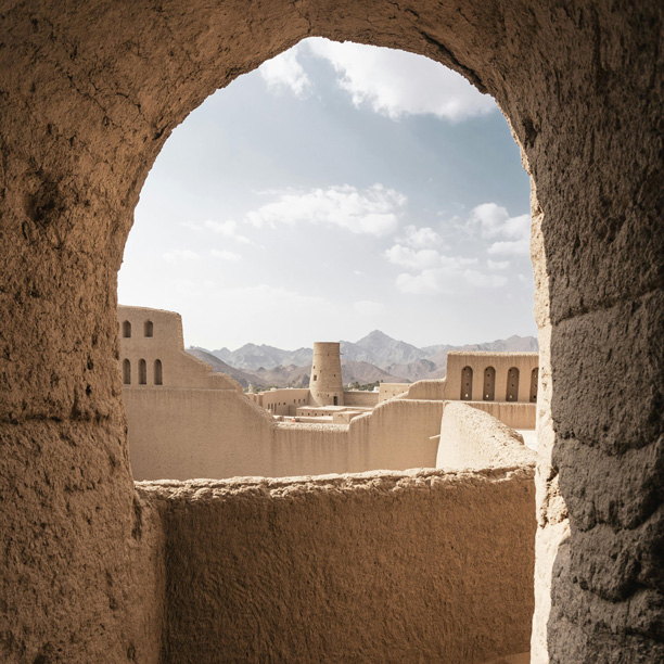 view through an archway at nizwa fort, oman