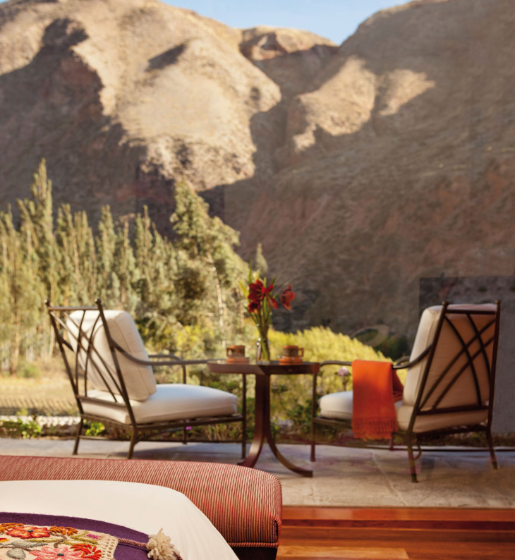 verandah of belmond hotel rio sagrado with view to the hillsides