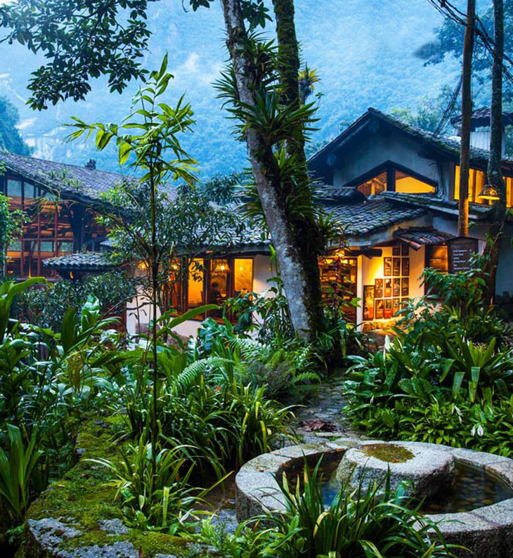 external view of the inkaterra hotel at night