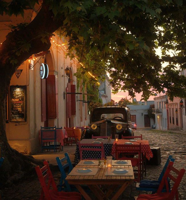 restaurant at night in uruguay with classic car