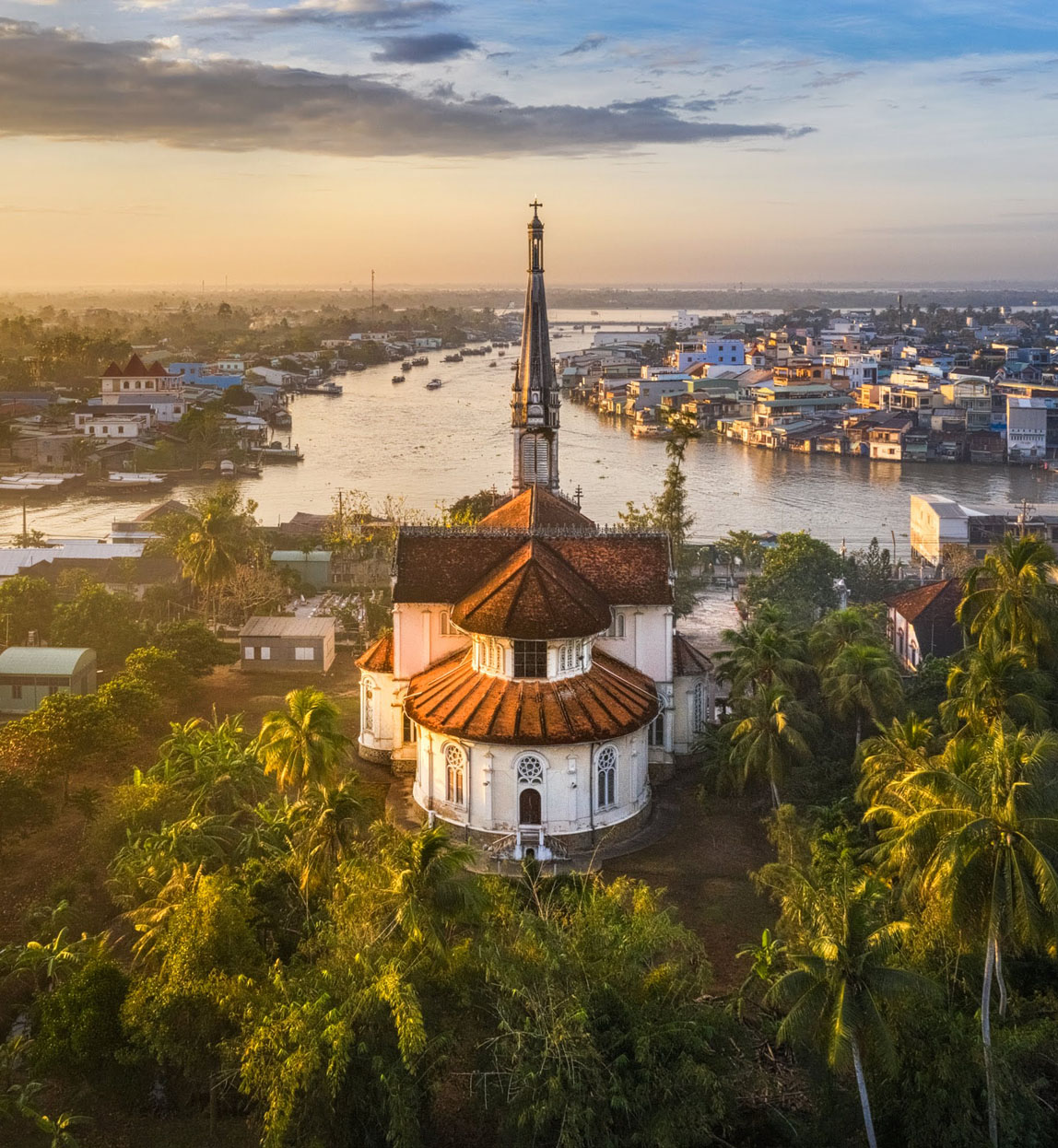 bend of the mekong river in town with historic temple
