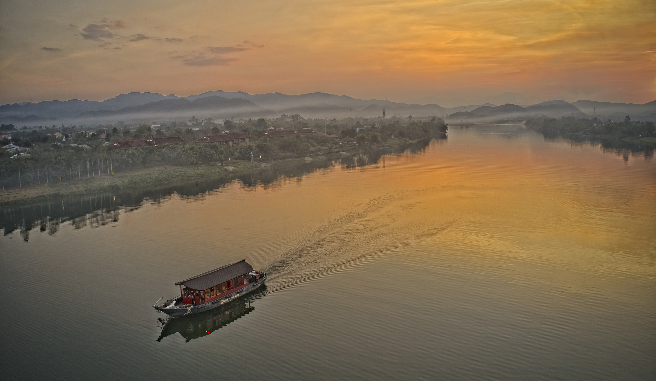sunset cruise on vietnam mekong river