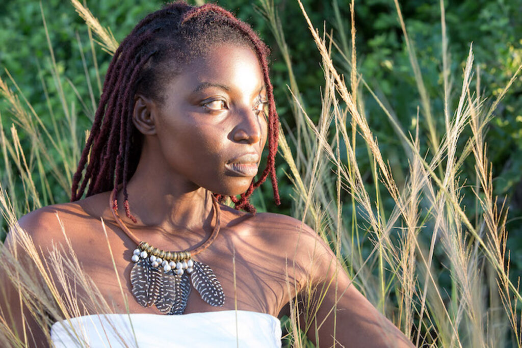model wearing the guinea fowl necklace from mulberry mongoose