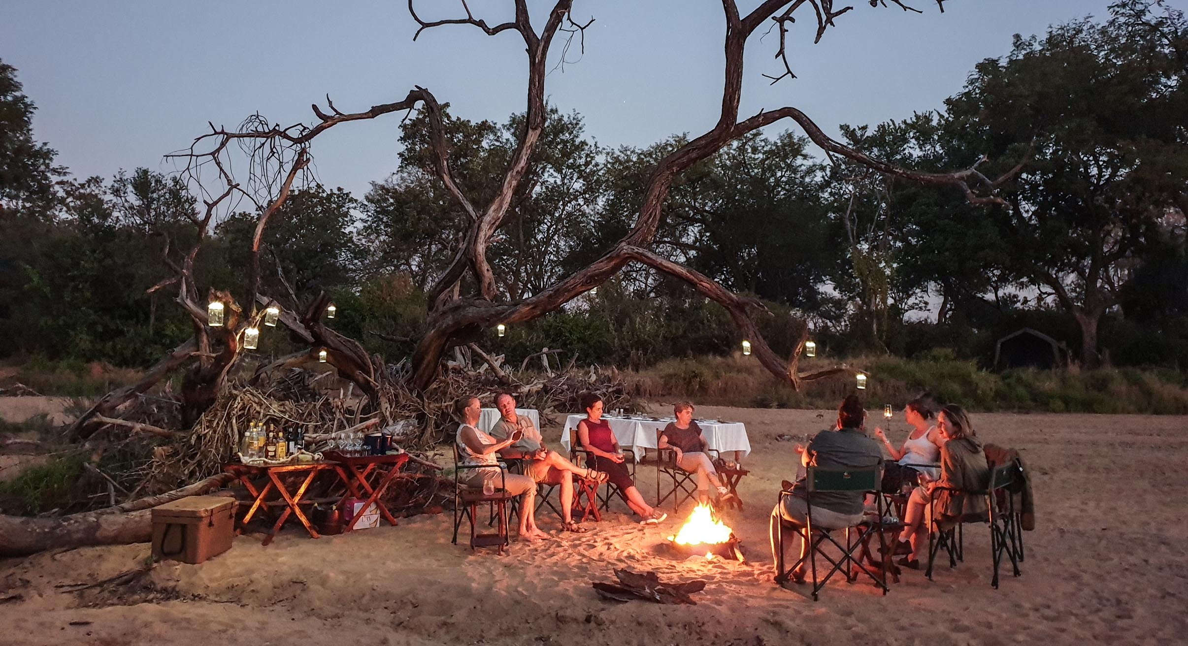 sundowners in save valley conservancy on wild dog conservation safari