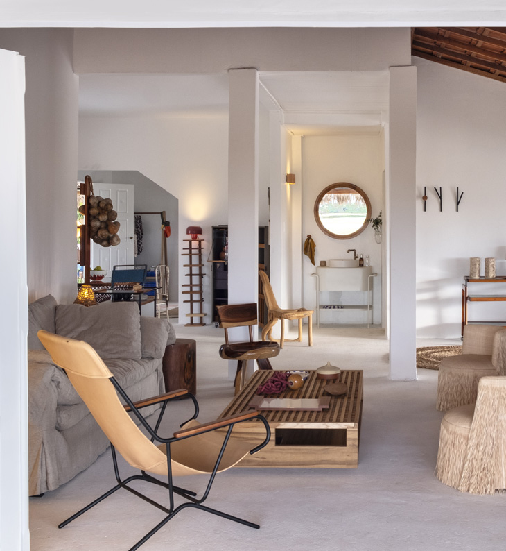 bedroom and lounge area at hotel oia casa lencois