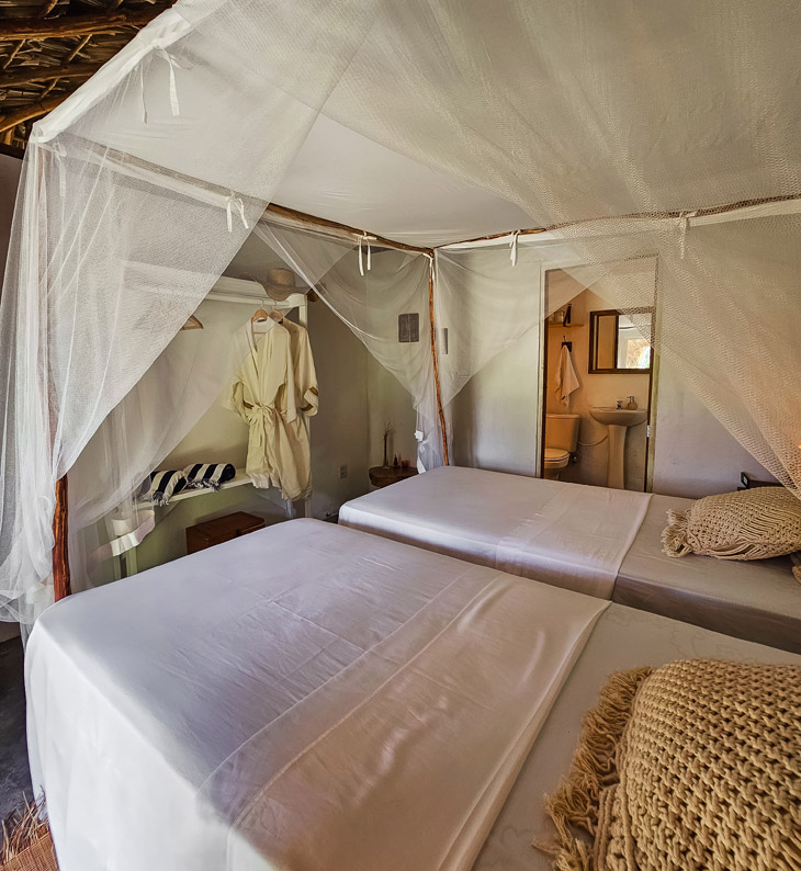 guest tent and bed at casa patacas in brazil