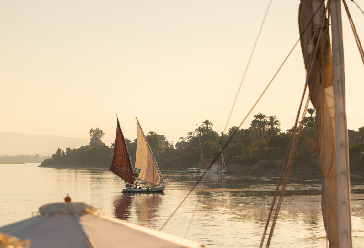 dahabias on the nile at aswan in egypt