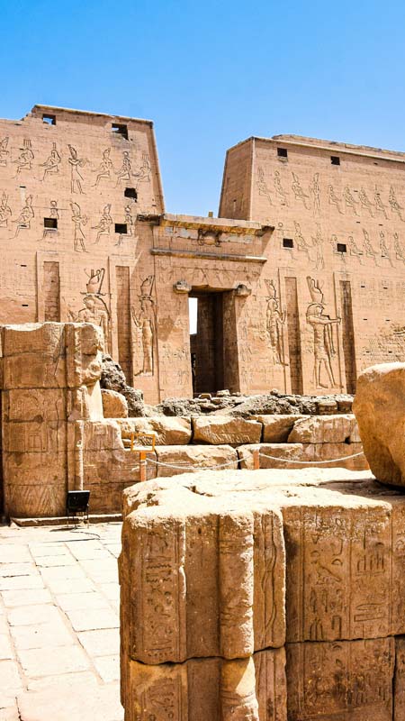 view of the facade of the edfu temple in egypt