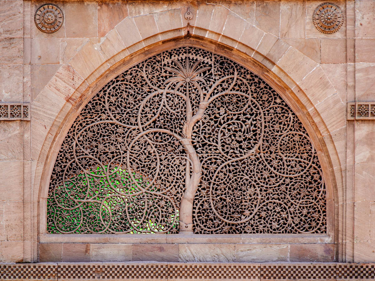 intricate tree carving on the Sidi Saiyyed Mosque, Ahmedabad, Gujarat, India.