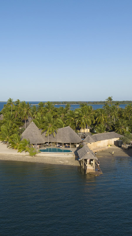aerial view of manda bay villas on kenya's coast on a luxury beach holiday