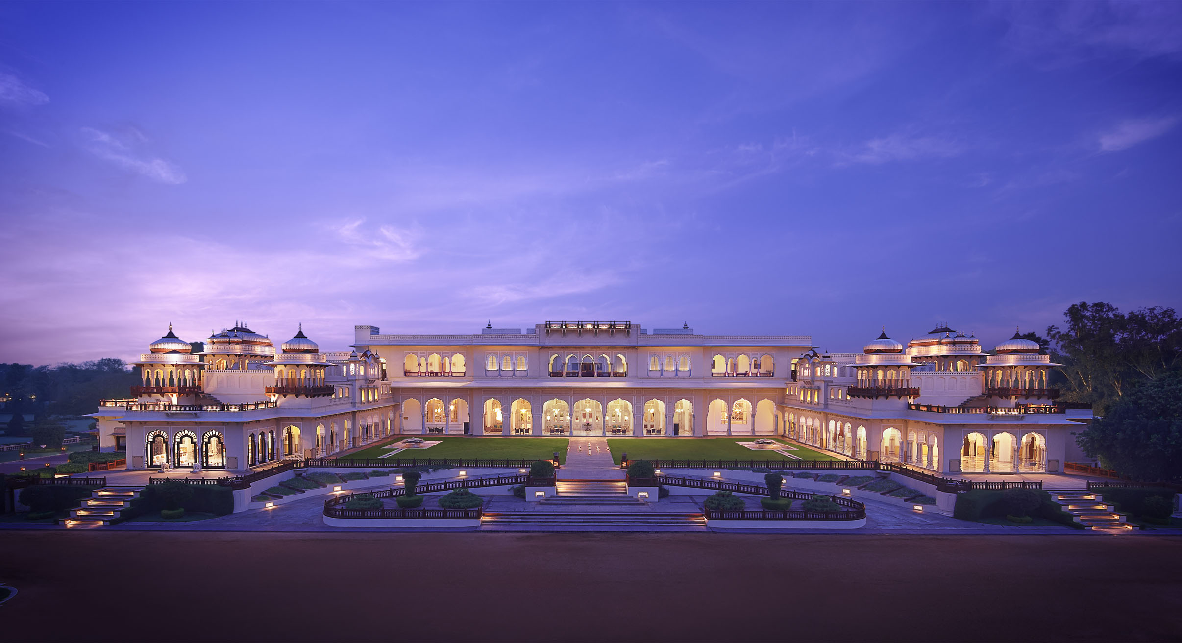 view of taj rambagh palace in jaipur at twilight