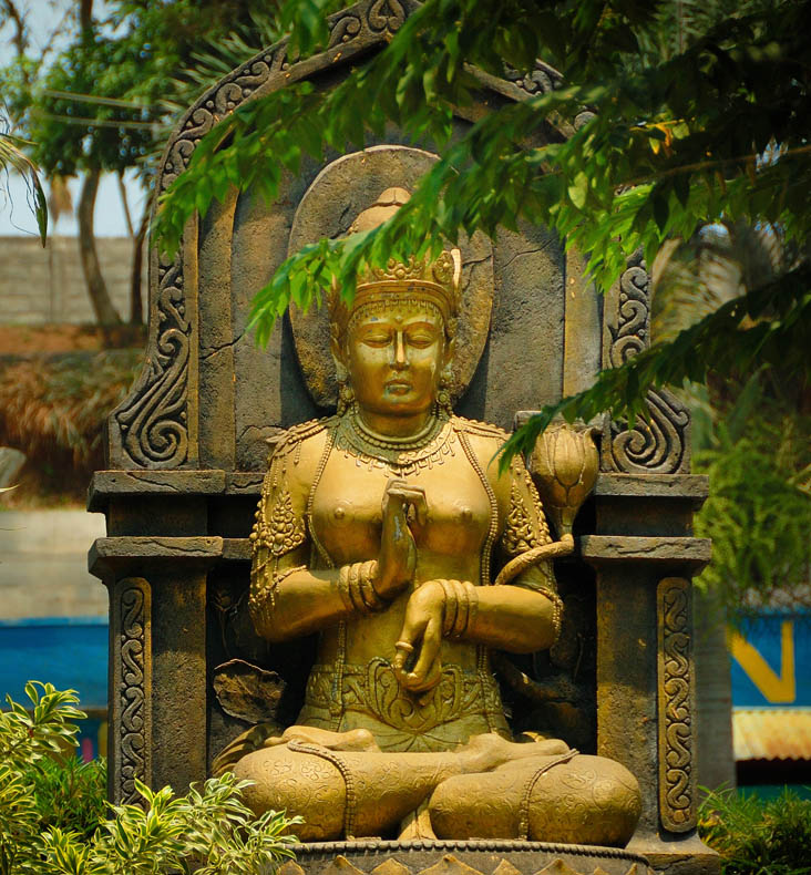Gold female figure statue. Ken Dedes Monument, Malang, east Java, Indonesia