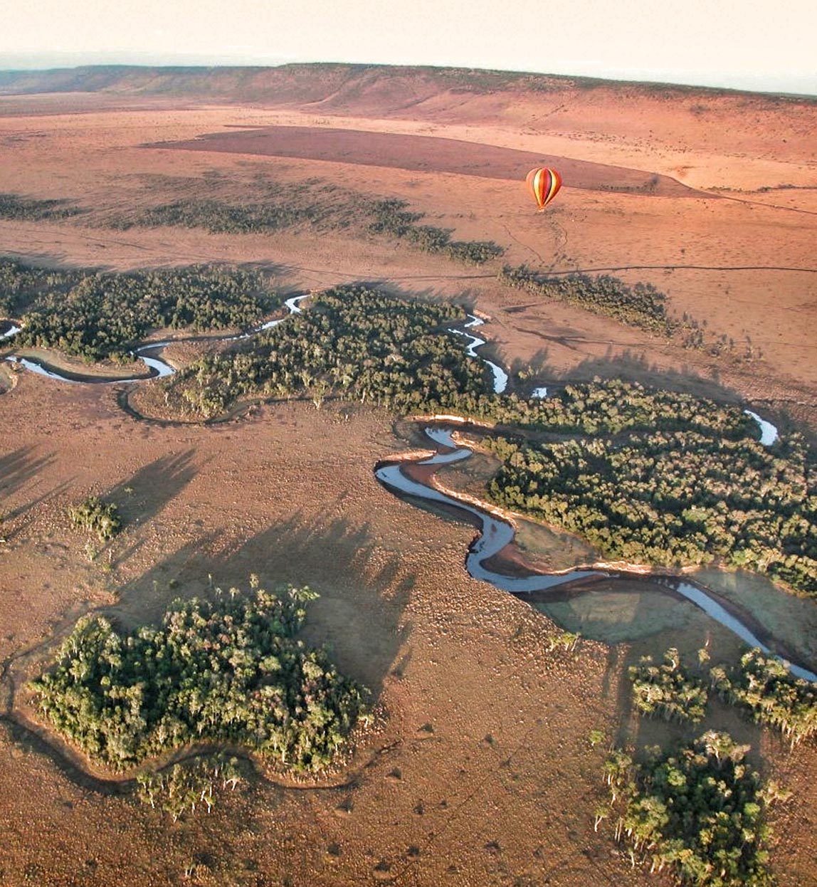 ballooning over a river in the maasai mara kenya