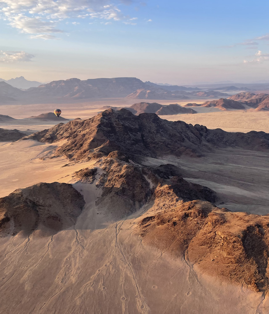 hot air ballooning over teh namibrand desert at wolwedans