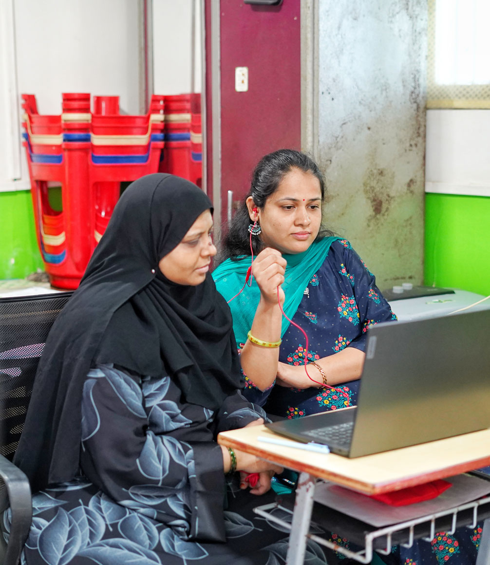 reality gives student sitting with teacher