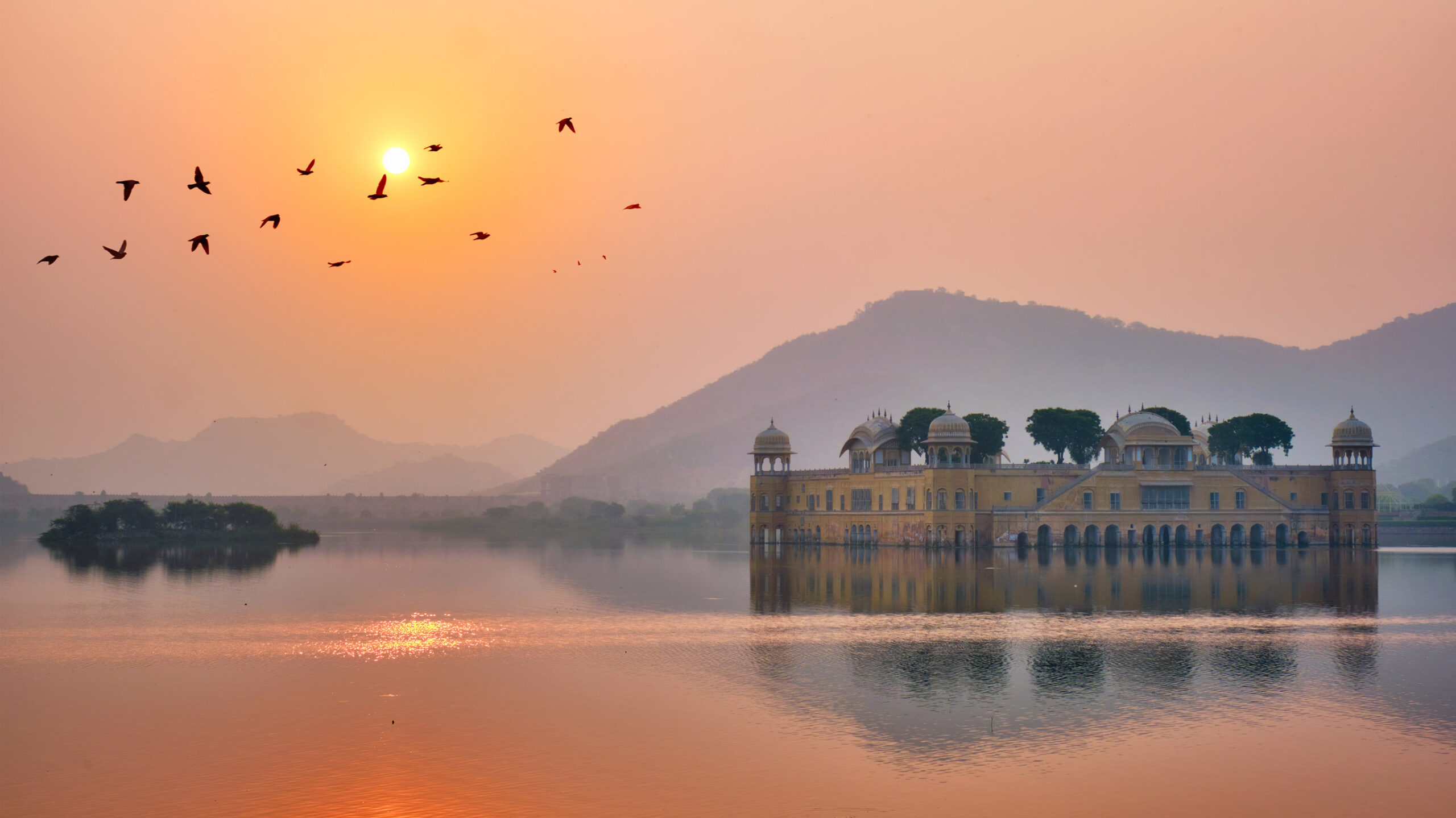 Tranquil morning at Jal Mahal Water Palace at sunrise in Jaipur. Rajasthan, India