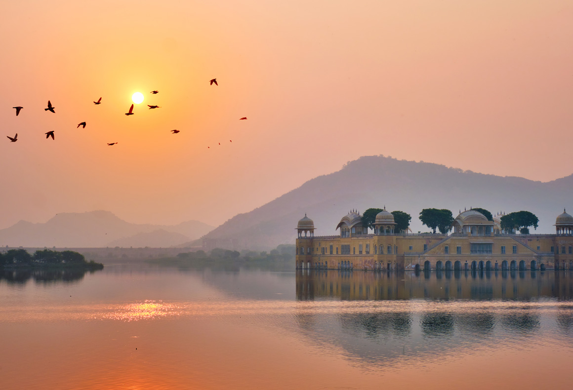 Tranquil morning at Jal Mahal Water Palace at sunrise in Jaipur. Rajasthan, India