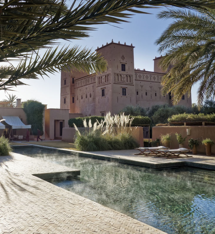 exterior and pool at dar ahlam hotel